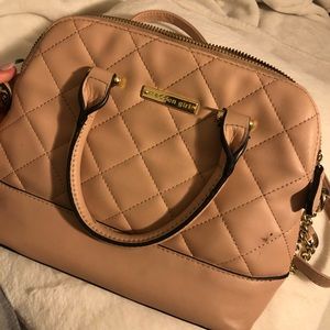 This cute pink bag is literally perfect for anything